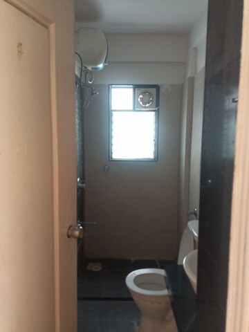 Bathroom in 2 BHK Apartment at Rama Celestial City, Ravet – for Rent