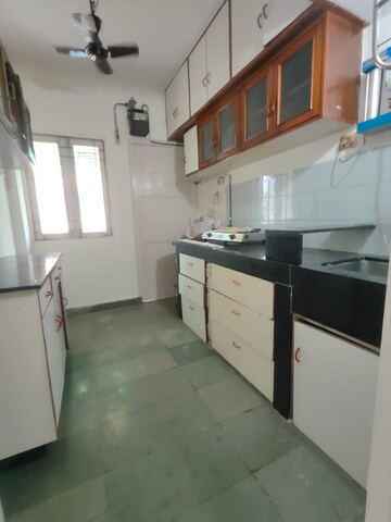 Kitchen in 1 BHK Apartment at Lokpuram CHS, Vasant Vihar – for Rent