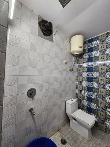 Bathroom in 2 BHK Apartment at Jharoda Majra Burari – for Rent