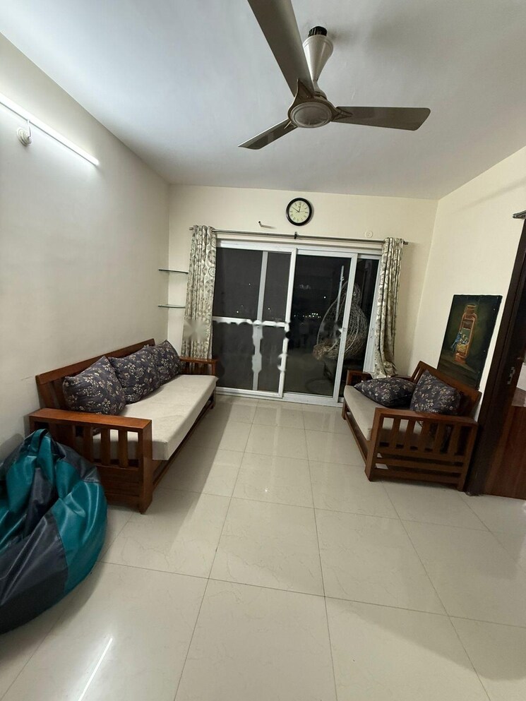 Living Room, theme-ambience-golf-view 3 Bedroom 1356 Sq.Ft. Apartment In Gachibowli Hyderabad 8983239