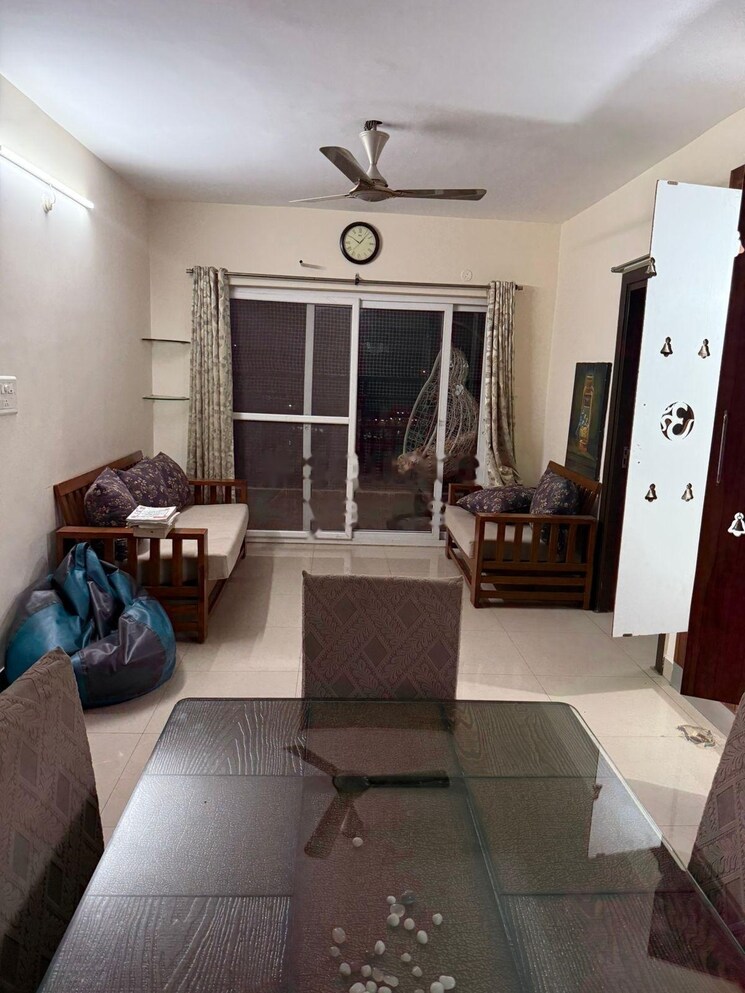 Living Room, theme-ambience-golf-view 3 Bedroom 1356 Sq.Ft. Apartment In Gachibowli Hyderabad 8983239