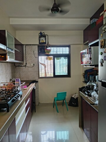 Kitchen in 3 BHK Apartment at Neelkanth Palms Phase 2, Thane West – for Rent