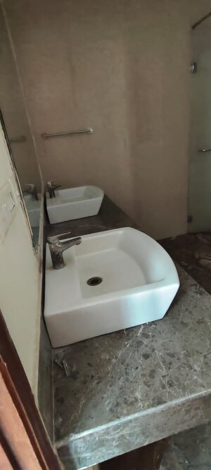 Bathroom in 3 BHK Apartment at Mahagun Mezzaria, Sector 78 – for Sale