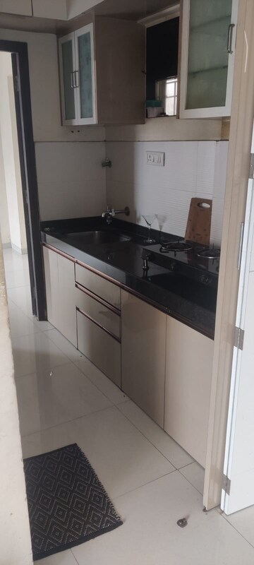 Kitchen in 1 BHK Apartment at Vijay Galaxy, Waghbil – for Sale