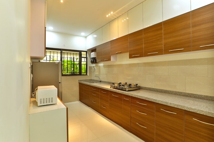 Kitchen, kumar-palmspring-towers 2 Bedroom 834 Sq.Ft. Apartment In Undri Pune 8983563