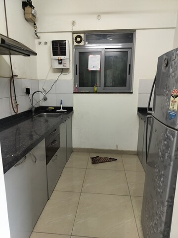 Kitchen in 1.5 BHK Apartment at Amanora Future Towers, Hadapsar – for Rent