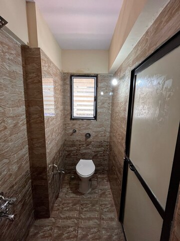 Bathroom in 2 BHK Apartment at Suyog CHS Goregaon West, Goregaon West – for Rent
