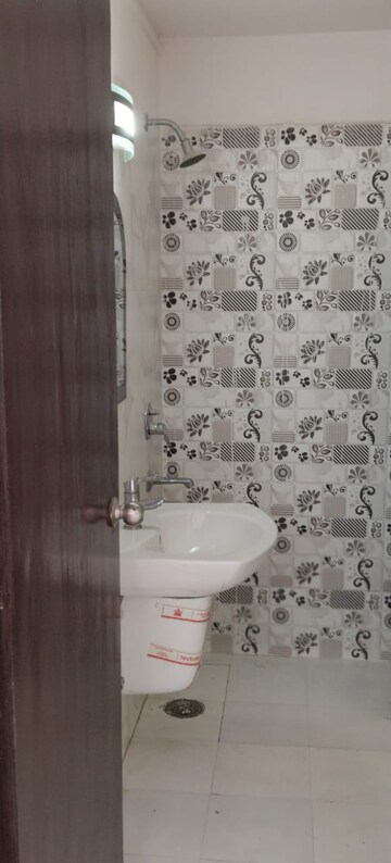 Bathroom in 2 BHK Apartment at Gulmohur Garden, Raj Nagar Extension – for Rent