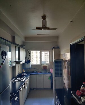 Kitchen in 3 BHK Apartment at Mahagun Moderne, Sector 78 – for Sale