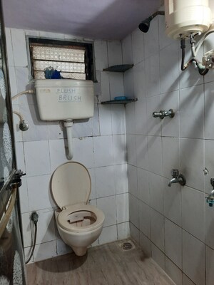 Bathroom in 2 BHK Apartment at Kopar Khairane – for Sale