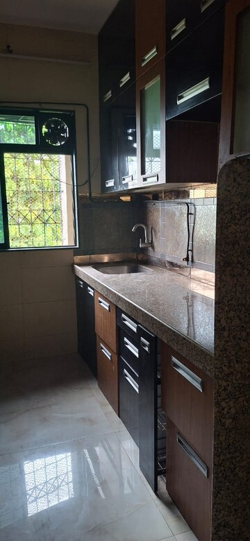 Kitchen in 1 BHK Apartment at Shiv Gauri, Malad West – for Rent