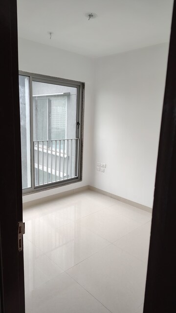 Room in 2 BHK Apartment at Sunteck City Avenue 4, Goregaon West – for Rent