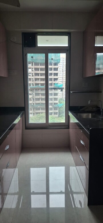 Kitchen in 2 BHK Apartment at Triumph Swastik, Malad West – for Rent