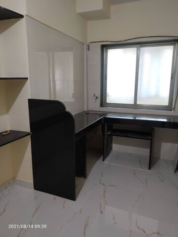 Kitchen in 2 BHK Apartment at Brightland Phase 1 CHS, Balkum Pada – for Rent