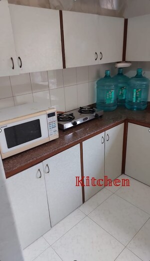 Kitchen in 2 BHK Apartment at Pushpa Milan Cumbala, Cumbala Hill – for Sale