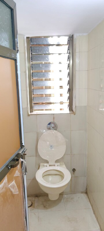 Bathroom in 1 BHK Apartment at Prithvi Palace, Dahisar West – for Rent