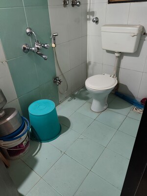 Bathroom in 2 BHK Apartment at Veena Saraswati Complex, Vasai East – for Sale