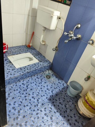Bathroom in 2 BHK Apartment at Veena Saraswati Complex, Vasai East – for Sale