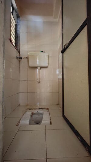 Bathroom in 1 RK Apartment at Dev Niketan, Dahisar East – for Sale