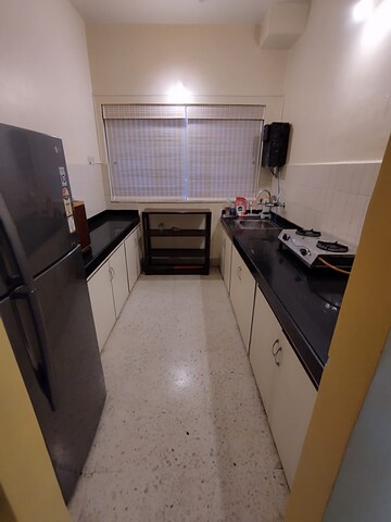 Kitchen in 3 BHK Apartment at Konark Enclave, Bund Garden Road – for Sale