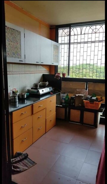 Kitchen in 2 BHK Apartment at Balaji Tower Vashi, Sanpada – for Rent