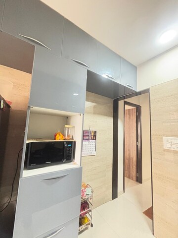Kitchen in 3 BHK Apartment at Bhakti Niwas CHS Sector 50 Seawoods, Seawoods – for Rent