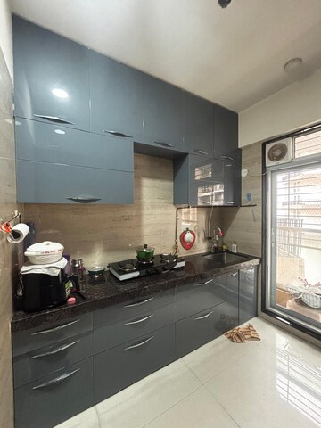 Kitchen in 3 BHK Apartment at Bhakti Niwas CHS Sector 50 Seawoods, Seawoods – for Rent