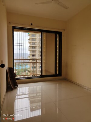 Room in 2 BHK Apartment at Gami Reagan, Ghansoli – for Sale