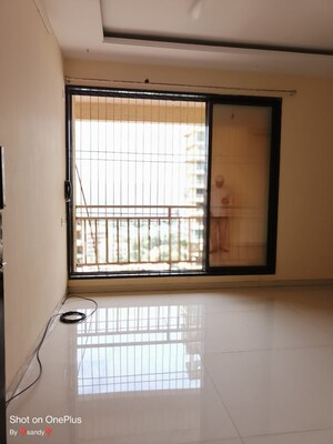 Room in 2 BHK Apartment at Gami Reagan, Ghansoli – for Sale