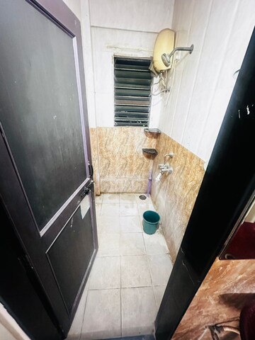 Bathroom in 1 BHK Apartment at Rajesh Meera Nagar Terrace CHS, Koregaon Park – for Rent