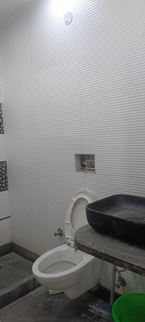 Bathroom in 3 BHK Builder Floor at Tilak Nagar – for Sale
