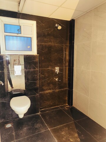 Bathroom in 2.5 BHK Apartment at Ambience Courtyard, Manikonda – for Rent