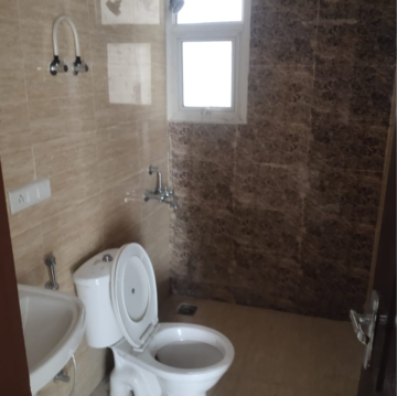 Bathroom in 3 BHK Apartment at Omaxe R2, Sarsawan – for Rent