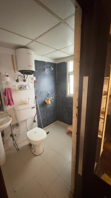 Bathroom in 2 BHK Apartment at Panchsheel Wellington, Dundahera – for Sale