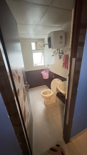 Bathroom in 2 BHK Apartment at Panchsheel Wellington, Dundahera – for Sale