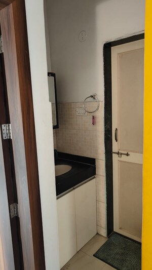 Bathroom in 2 BHK Apartment at Daffodils Housing Society Row House, Pimple Saudagar – for Sale