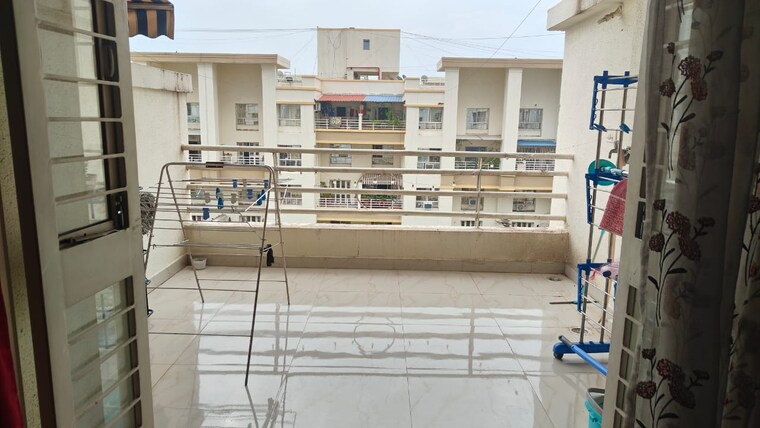 Balcony, daffodils-housing-society-row-house 2 Bedroom 1100 Sq.Ft. Apartment In Pimple Saudagar Pune 8985545