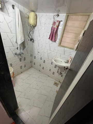 Bathroom in 2 BHK Apartment at RNA NG Paradise, Mira Road – for Sale