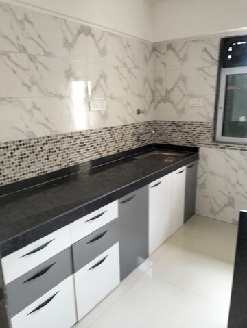 Kitchen in 1 BHK Apartment at DGS Sheetal Tapovan, Malad East – for Rent