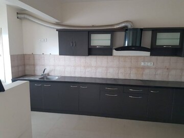 Kitchen in 3 BHK Apartment at Salarpuria Sattva Greenage, Hosur Road – for Rent