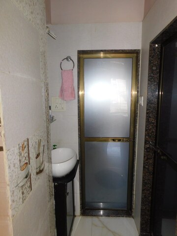 Bathroom in 1 BHK Apartment at Malkani Palace CHS, Jogeshwari West – for Sale