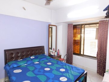 Bedroom in 1 BHK Apartment at Malkani Palace CHS, Jogeshwari West – for Sale