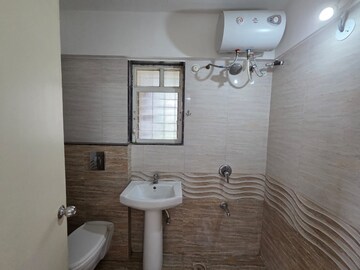 Bathroom in 2 BHK Apartment at Aum Casa Imperia EWS, Wakad – for Rent
