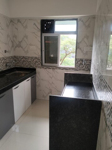 Kitchen in 1 BHK Apartment at DGS Sheetal Tapovan, Malad East – for Rent