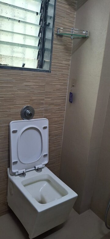 Bathroom in 1 BHK Apartment at Shiv Aradhana CHS, Malad West – for Rent