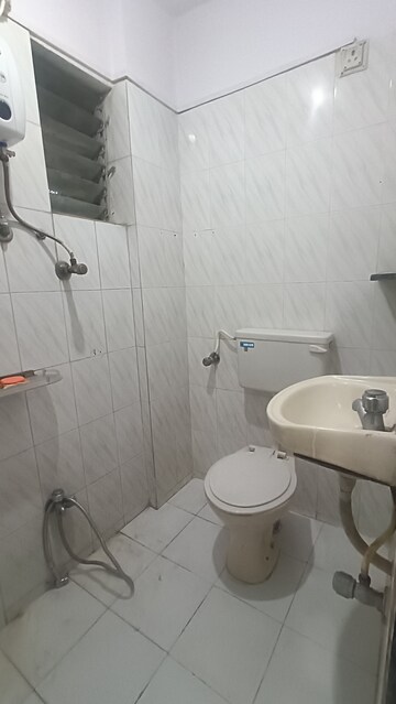 Bathroom in 1 BHK Apartment at Omkar Prasad CHS, Borivali West – for Rent