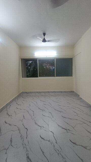 Bedroom in 1 BHK Apartment at Omkar Prasad CHS, Borivali West – for Rent