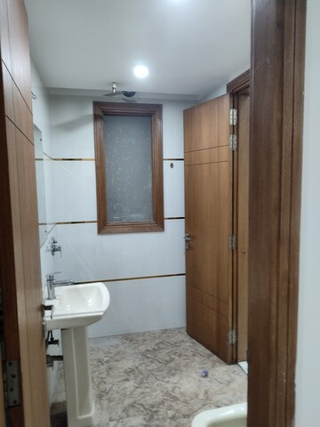Bathroom in 4 BHK Builder Floor at Freedom Fighters Enclave – for Rent