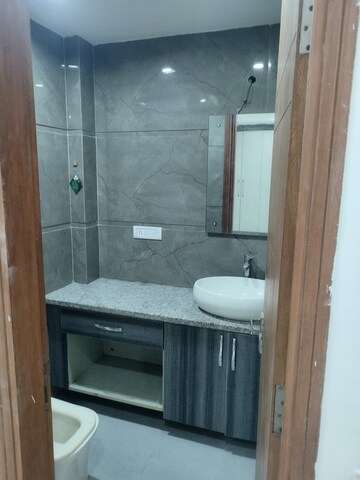 Bathroom in 4 BHK Builder Floor at Freedom Fighters Enclave – for Rent