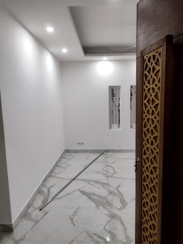 Bedroom in 4 BHK Builder Floor at Freedom Fighters Enclave – for Rent